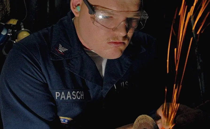 A man doing machining operation